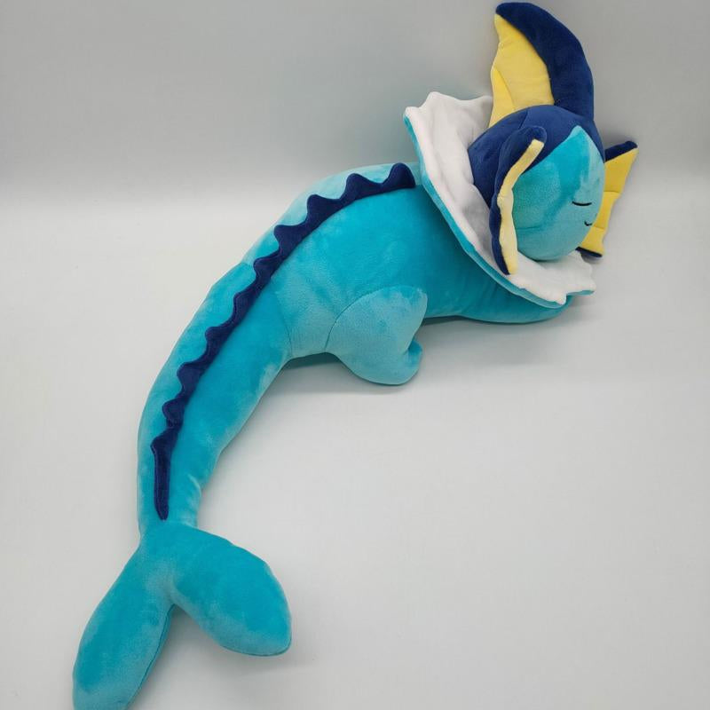 Don't miss the opportunity to catch some Z's with your favorite Vaporeon ! Place your order now and enhance your collection with this endearing sleeping plushy