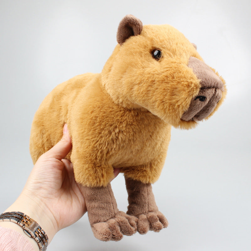 Discover joy with our Capybara Plush Toy, an adorable addition to kids' stuffed animals collection. This cuddly gift combines the charm of a capybara with premium quality, making it an ideal present for young animal enthusiasts