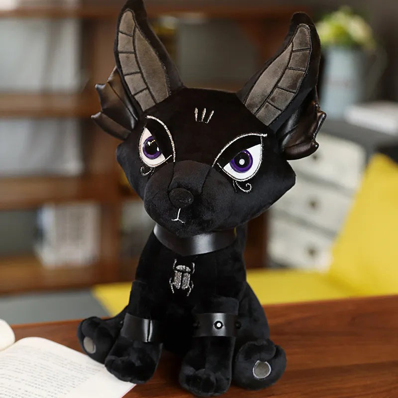 This charming plush toy represents Anubis in his canine form. Anubis, god of mummification and gatekeeper of the underworld